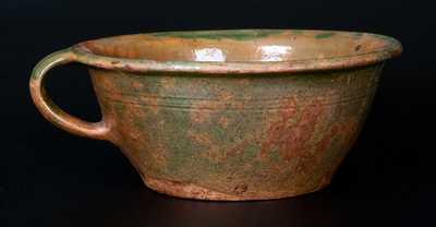 Rare Copper-Glazed Redware Colander, probably New England, first half 19th century