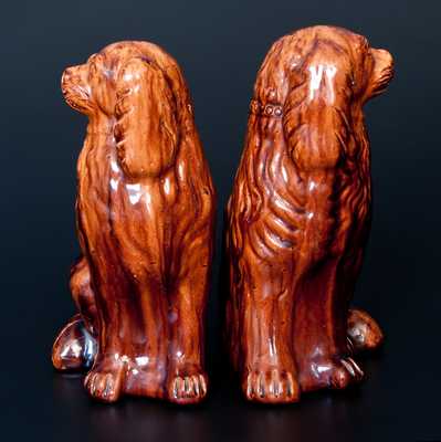 Important Pair of JOHN BELL, Waynesboro, PA Redware Spaniels