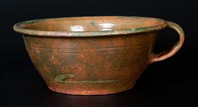 Rare Copper-Glazed Redware Colander, probably New England, first half 19th century