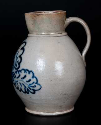 Unusual Northeastern U.S. Stoneware Pitcher with Finely Slip-Trailed Leaf Decoration