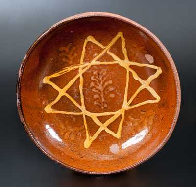 Unusual Redware Dish with Slip Star and Foliate Sprig Decoration
