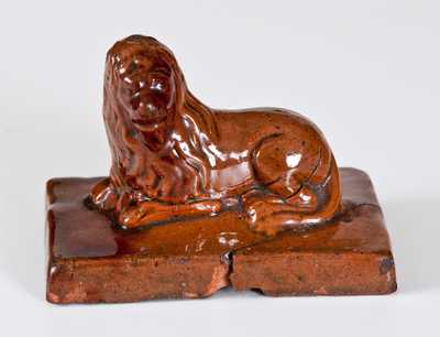 Glazed Redware Lion Paperweight, American, 19th century