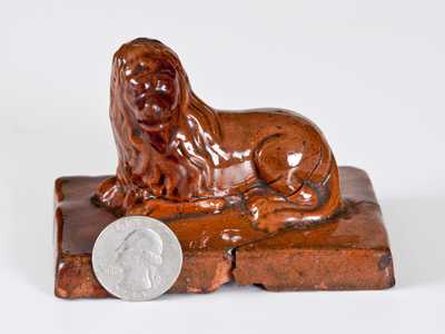 Glazed Redware Lion Paperweight, American, 19th century