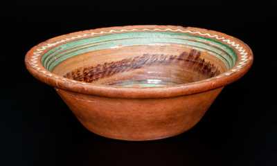 Fine Mid-Atlantic Redware Bowl with Three-Color Slip Interior