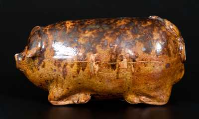 Unusual Rockingham Pig Flask with Manganese Sponging, probably Midwestern, circa 1875-95