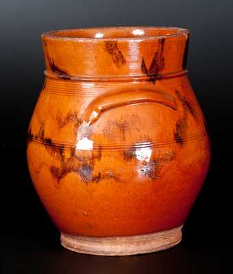 New England Bulbous Redware Jar with Manganese Decoration