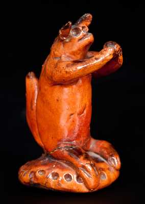 Unusual Redware Seated Squirrel Figure on Base, probably Pennsylvania, 19th century