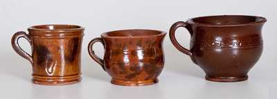 Three American Redware Drinking Vessels