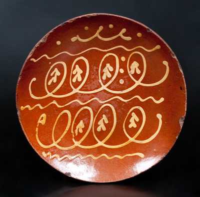 Outstanding Slip-Decorated Redware Charger, probably Norwalk, CT, circa 1820-40