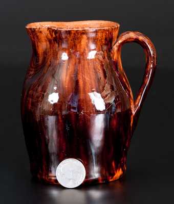 Fine JOHN BELL, Waynesboro, PA, Redware Cream Pitcher with Sponged Manganese Decoration