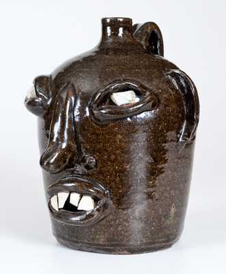 Stoneware Face Jug with Quartz Eyes and China Teeth, Southern US, 20th century