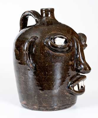 Stoneware Face Jug with Quartz Eyes and China Teeth, Southern US, 20th century