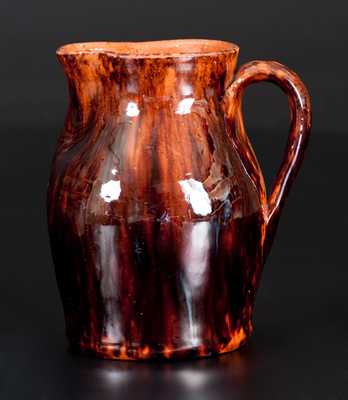 Fine JOHN BELL, Waynesboro, PA, Redware Cream Pitcher with Sponged Manganese Decoration