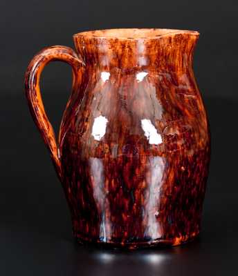 Fine JOHN BELL, Waynesboro, PA, Redware Cream Pitcher with Sponged Manganese Decoration
