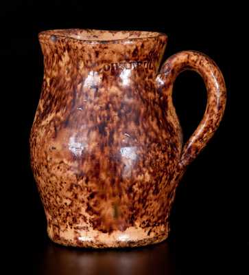 Very Fine JOHN BELL (Waynesboro, PA) Diminutive Redware Cream Pitcher w/ Sponged Manganese Decoration
