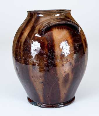 Fine Handled Redware Jar with Streaked Manganese Decoration, Eastern U.S. origin.
