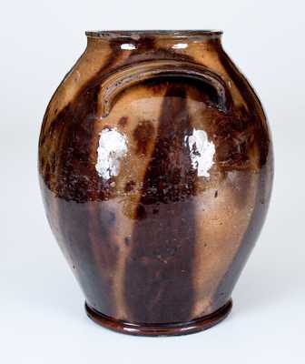 Fine Handled Redware Jar with Streaked Manganese Decoration, Eastern U.S. origin.