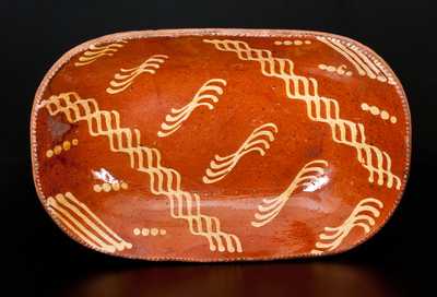 Large Redware Platter with Profuse Yellow Slip Decoration, probably Philadelphia