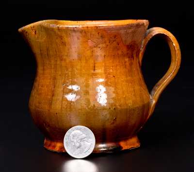 Bulbous Redware Cream Pitcher with Vibrant Lead Glaze