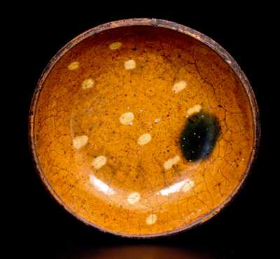 Small Pennsylvania Redware Dish with Spotted Yellow Slip Decoration