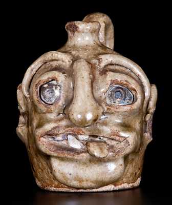 Outstanding Edgefield Stoneware Face Jug with Protruding Tongue, Edgefield, SC origin, circa 1860-80