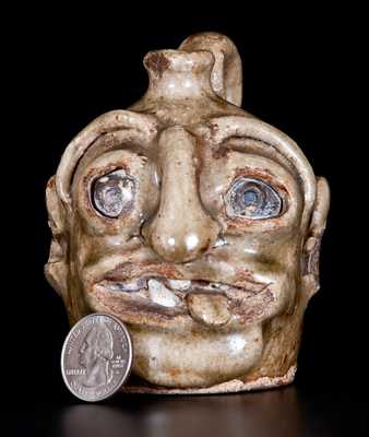 Outstanding Edgefield Stoneware Face Jug with Protruding Tongue, Edgefield, SC origin, circa 1860-80