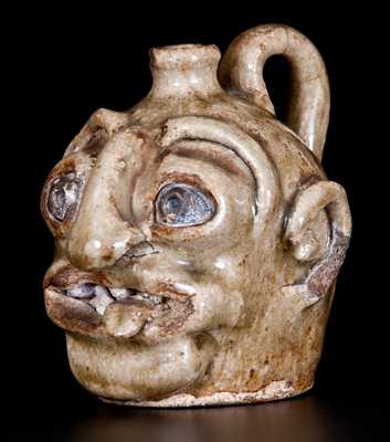 Outstanding Edgefield Stoneware Face Jug with Protruding Tongue, Edgefield, SC origin, circa 1860-80