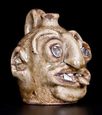 Outstanding Edgefield Stoneware Face Jug with Protruding Tongue, Edgefield, SC origin, circa 1860-80