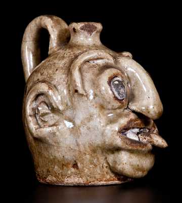 Outstanding Edgefield Stoneware Face Jug with Protruding Tongue, Edgefield, SC origin, circa 1860-80