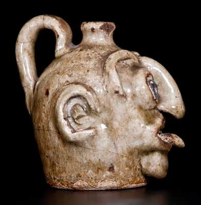Outstanding Edgefield Stoneware Face Jug with Protruding Tongue, Edgefield, SC origin, circa 1860-80