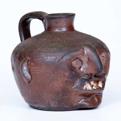 Very Rare  Guy Daugherty, Bethune, Kershaw County, South Carolina Stoneware Face Jug, c1950