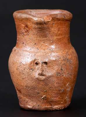 Miniature Stoneware Pitcher with Hand-Modeled Face Under Spout, probably Virginia