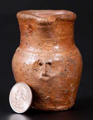 Miniature Stoneware Pitcher with Hand-Modeled Face Under Spout, probably Virginia