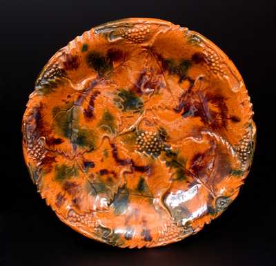 Unusual Multi-Glazed Redware Plate with Molded Pattern, probably Pennsylvania, fourth quarter 19th century