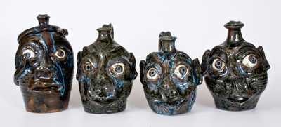 Four Alkaline-Glazed Stoneware Face Jugs, W.A. Flowers, Almond, NC, late 20th century
