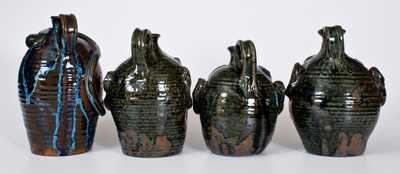 Four Alkaline-Glazed Stoneware Face Jugs, W.A. Flowers, Almond, NC, late 20th century