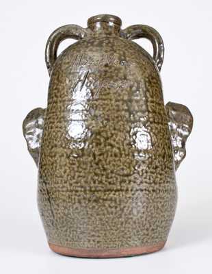 Unusual Alkaline-Glazed Stoneware Face Jug with Pig s Snout, Signed and Dated 