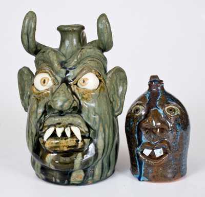 Two W.A. Flowers Alkaline-Glazed Stoneware Face Jugs, Almond, NC, late 20th century