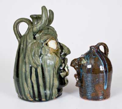 Two W.A. Flowers Alkaline-Glazed Stoneware Face Jugs, Almond, NC, late 20th century