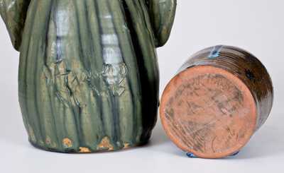 Two W.A. Flowers Alkaline-Glazed Stoneware Face Jugs, Almond, NC, late 20th century