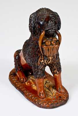 Large-Sized Pennsylvania Redware Figure of a Seated Dog w/ Basket