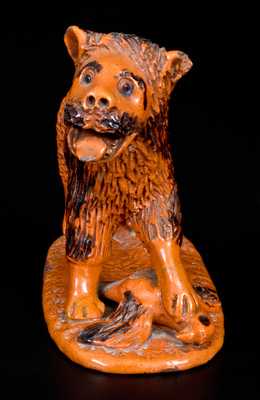 Exceedingly Rare Pennsylvania Redware Figure of a Lion Standing atop a Bird