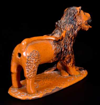 Exceedingly Rare Pennsylvania Redware Figure of a Lion Standing atop a Bird