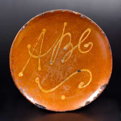 Redware Plate with Yellow Slip Inscription,