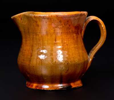 Bulbous Redware Cream Pitcher with Vibrant Lead Glaze