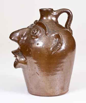 Stoneware Face Jug, Stamped 