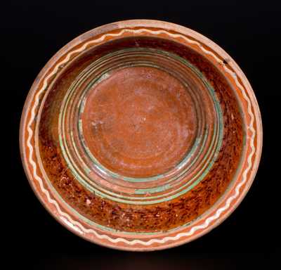 Redware Bowl with Three-Color Slip-Decorated Interior