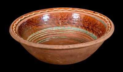 Redware Bowl with Three-Color Slip-Decorated Interior