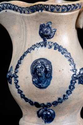 Unusual Small-Sized Stoneware Pitcher w/ Applied Woman s Bust and Coggled Hearts