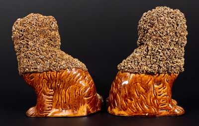 Unusual Pair of Rockingham-Glazed Spaniels, probably New York State origin, c1860
